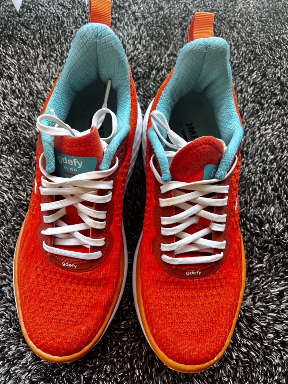 gdefy XLR8 Orange Knit Sneakers with Teal Lining